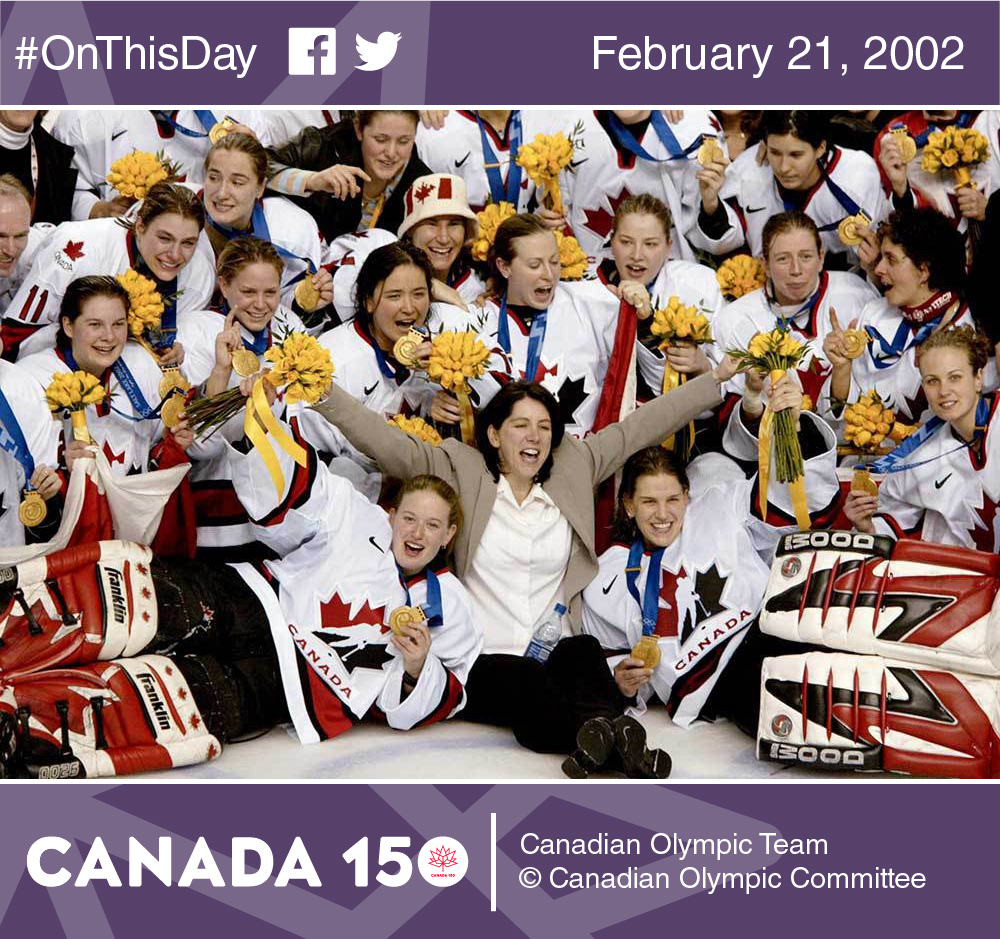 The members of the women's ice hockey team celebrate their gold medal.