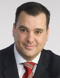 Photo of the Honourable James Moore, P.C, M.P., Minister of Canadian Heritage and Official Languages