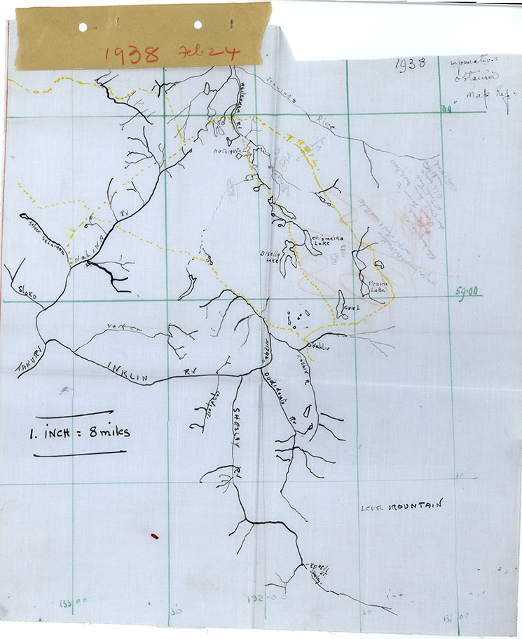 Color photo showing a hand-drawn trail system on a grid page with handwritten information indicating date, locations, scale, and longitude &  latitude