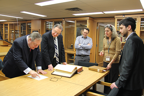 From left to right: Dr. Guy Berthiaume, the Honourable Rafael Barak, Dr. Howard Fremeth, Leah Cohen and Rabbi Michael Kent examining the information provided in the auction description of Josephus Flavius’ The Jewish War, the only surviving document written by an eyewitness. 